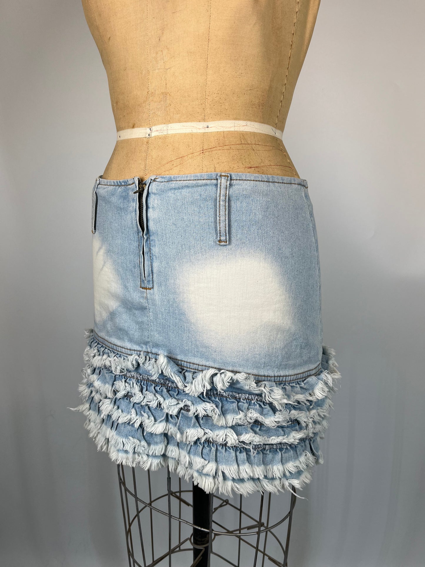 Distressed Ruffle Mini Skirt With Faded Denim Light Wash