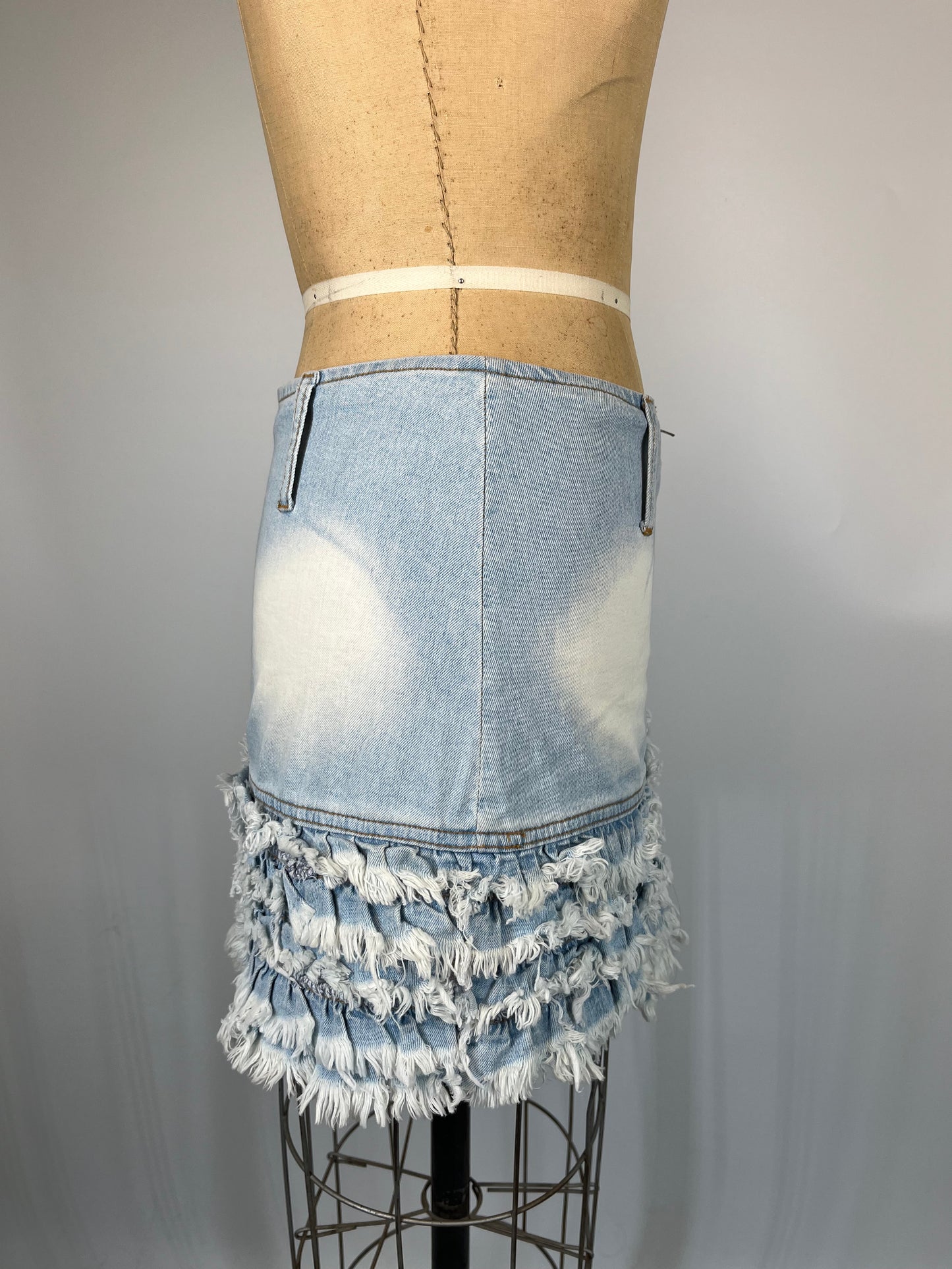 Distressed Ruffle Mini Skirt With Faded Denim Light Wash