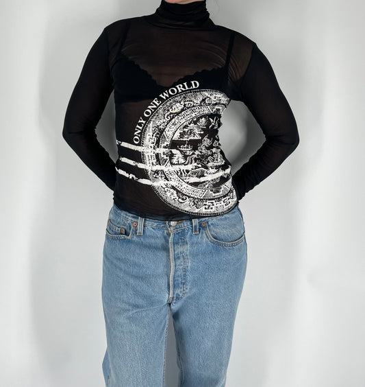 Made in France Mesh Long Sleeve Turtle Neck Top With “Only One World” Graphic