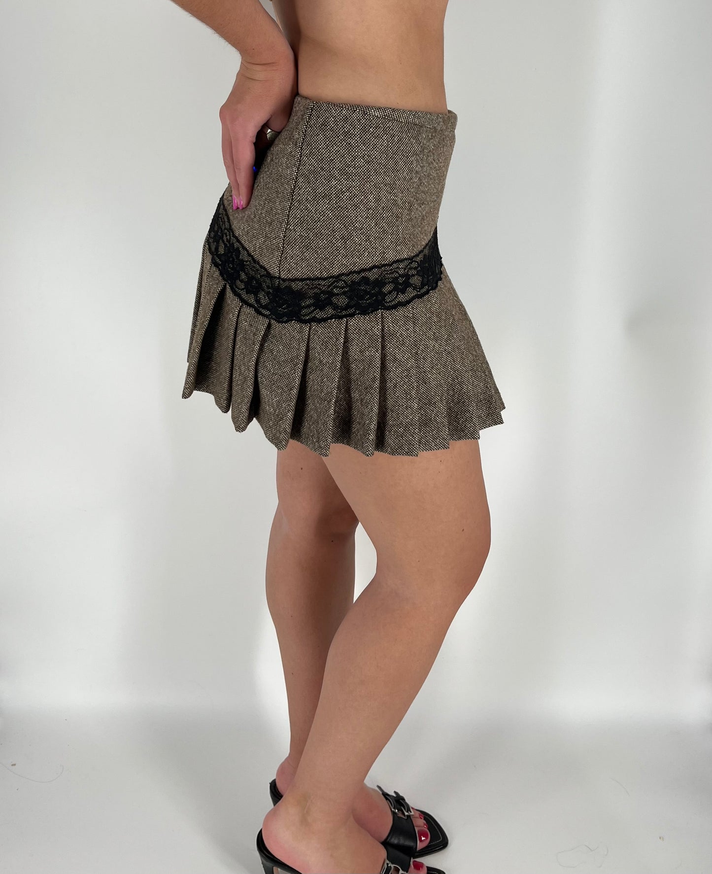 Pleated Mini Skirt With Asymmetrical Lace and Rosette