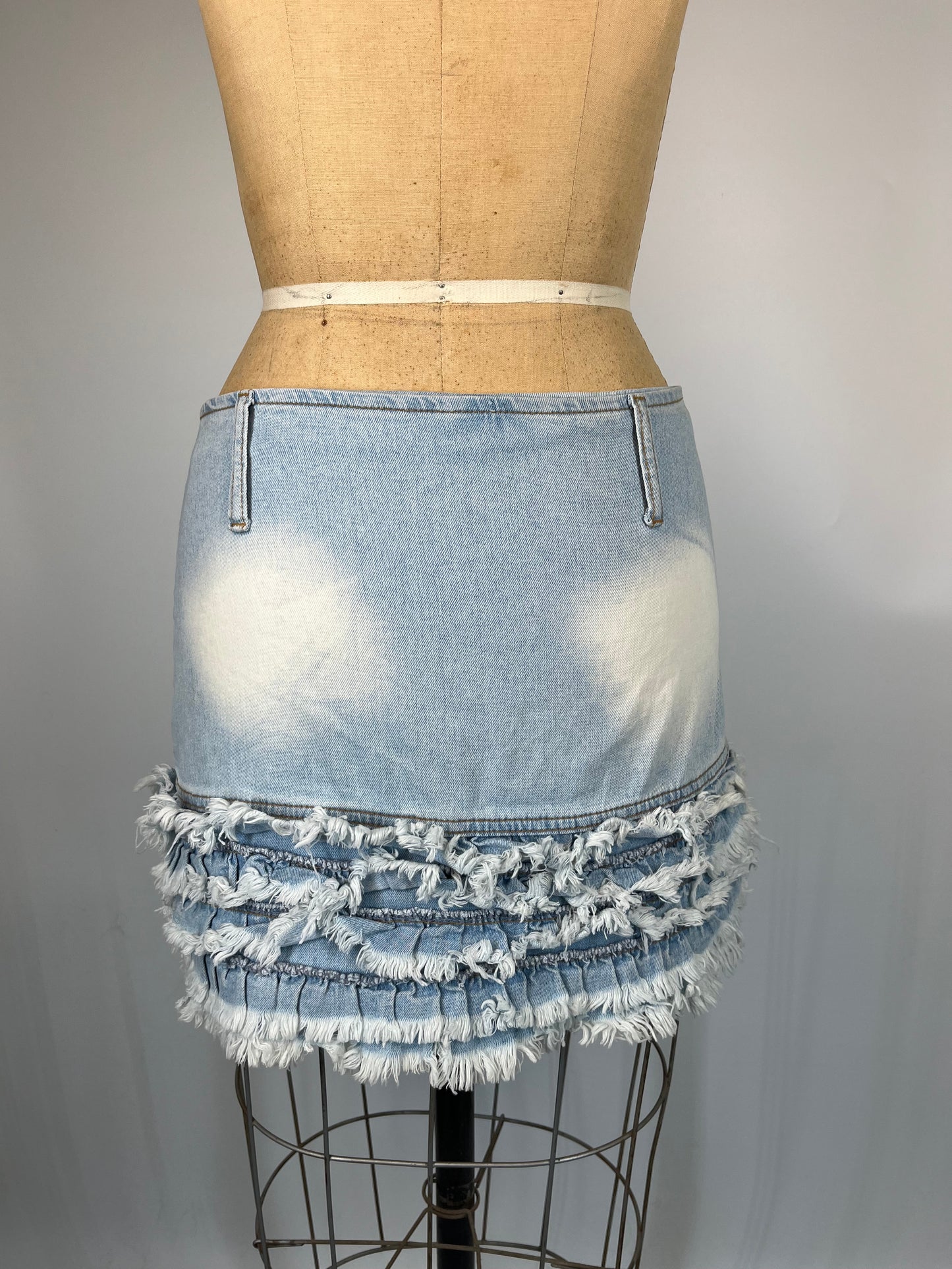 Distressed Ruffle Mini Skirt With Faded Denim Light Wash
