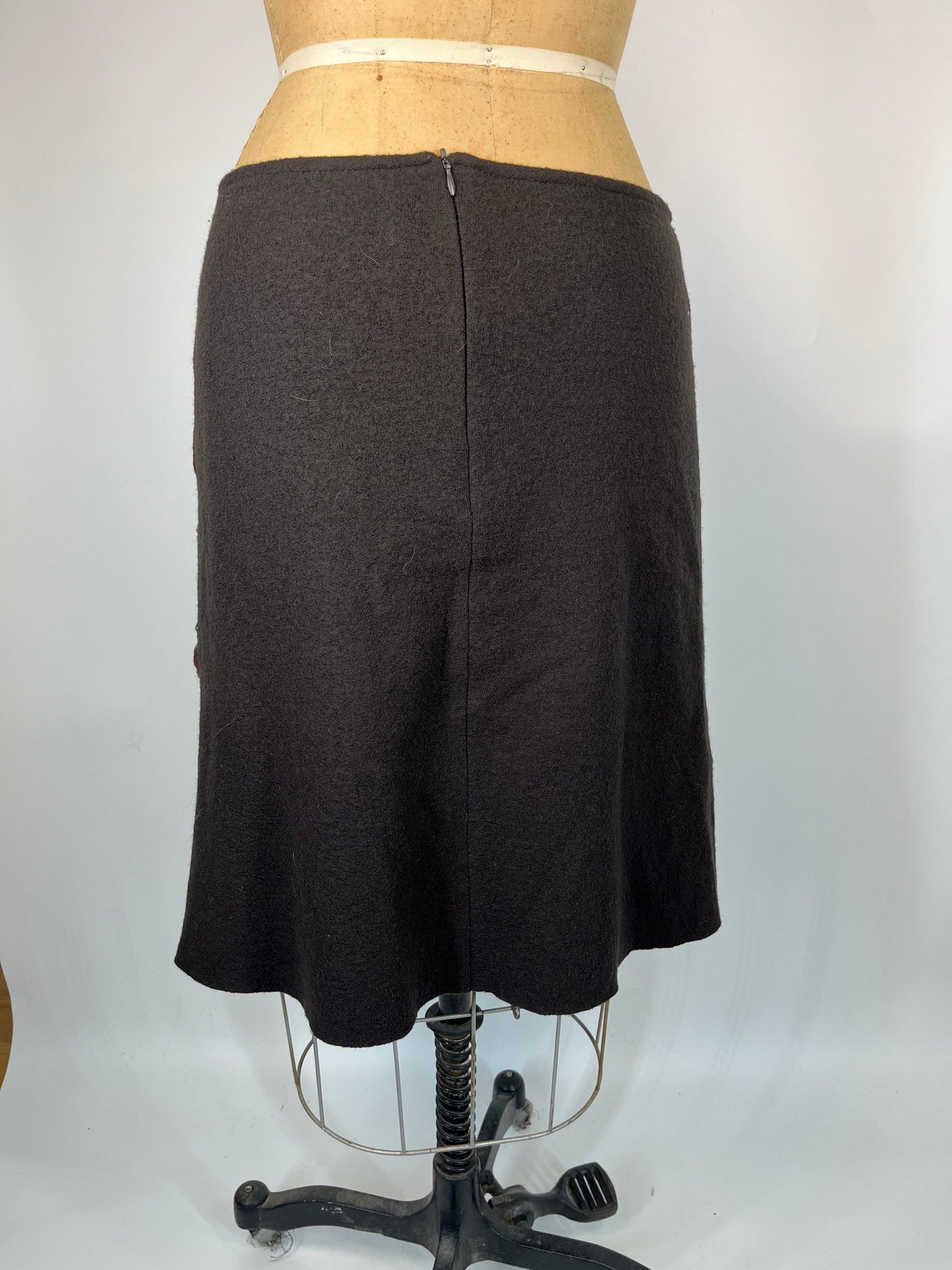 Paid Asymmetric Skirt With Contrast Stitching and Button Detail