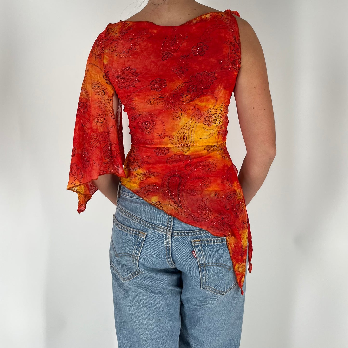 Tie Dye Mesh Asymmetrical Top With Glitter and Paisley Print
