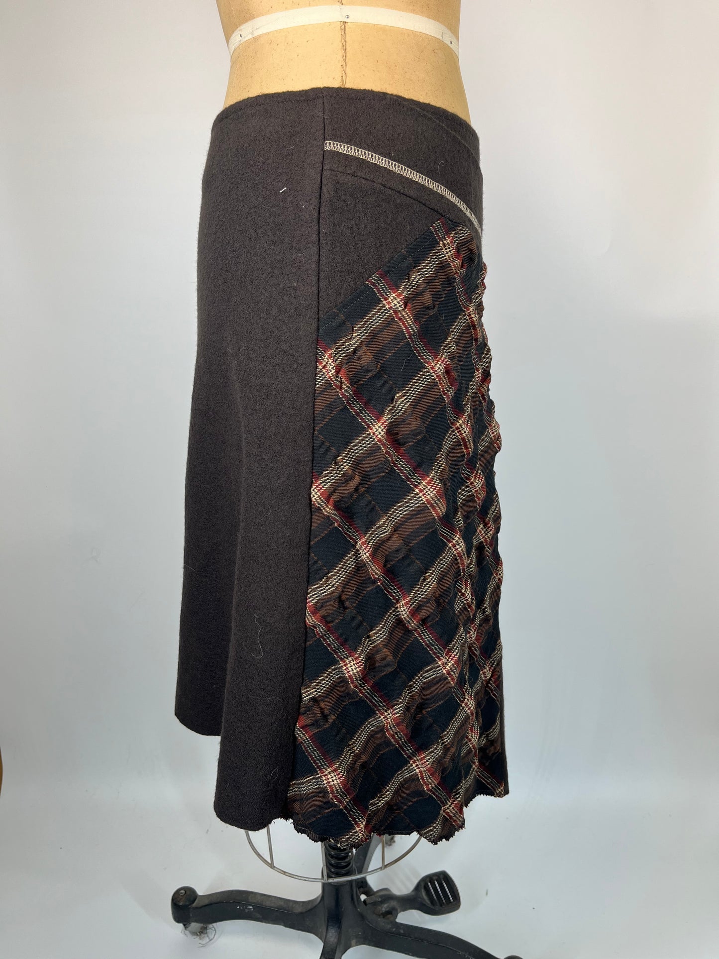 Paid Asymmetric Skirt With Contrast Stitching and Button Detail