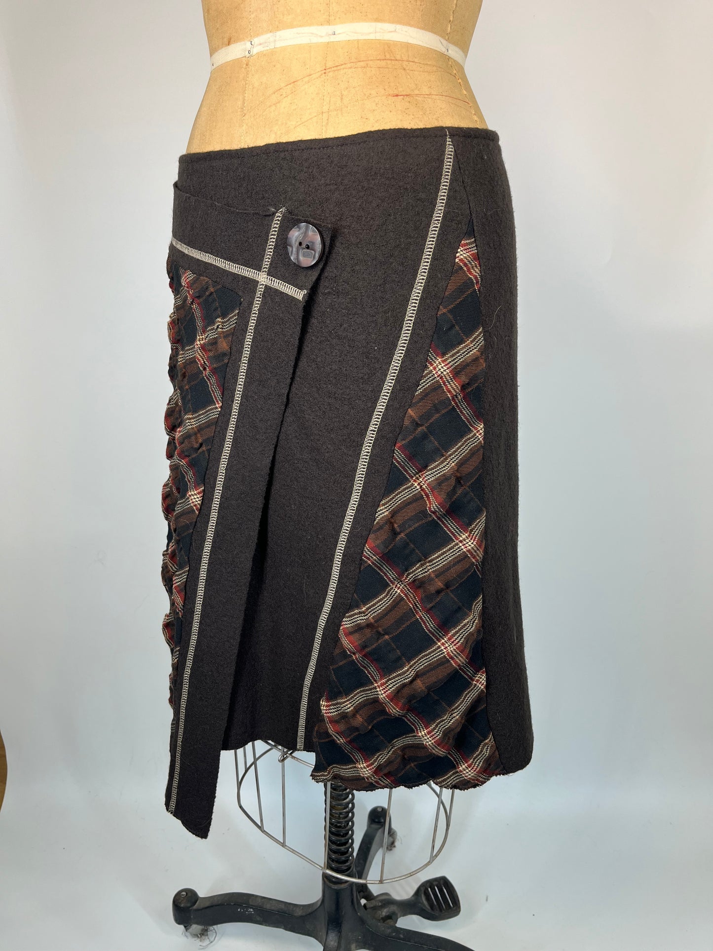 Paid Asymmetric Skirt With Contrast Stitching and Button Detail